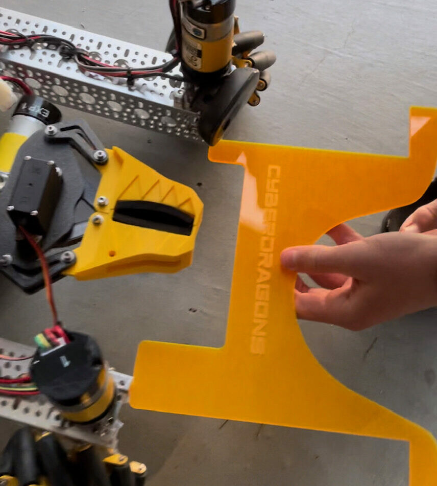 Person holding custom robot part